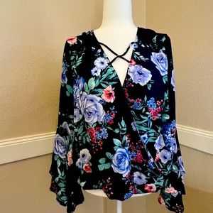 Charming Charlie Blue floral top.